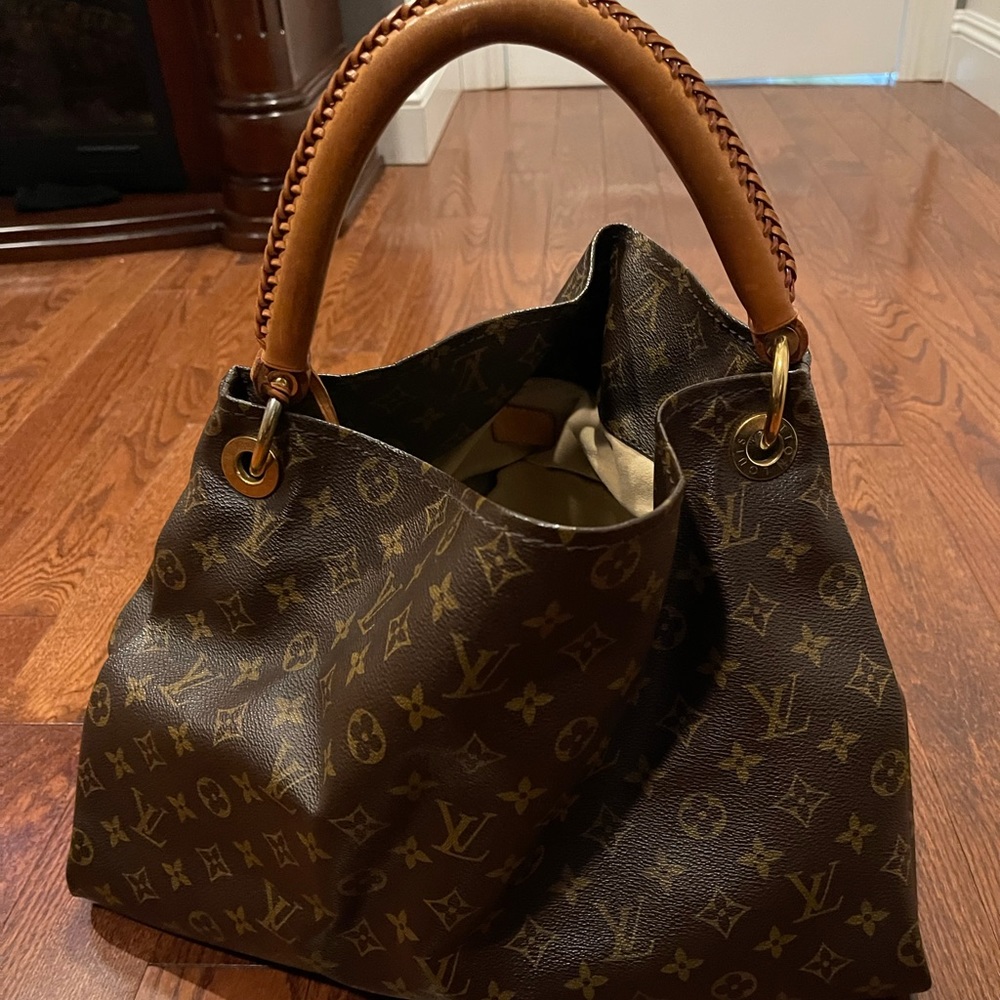 Used lv bag, inside has stains